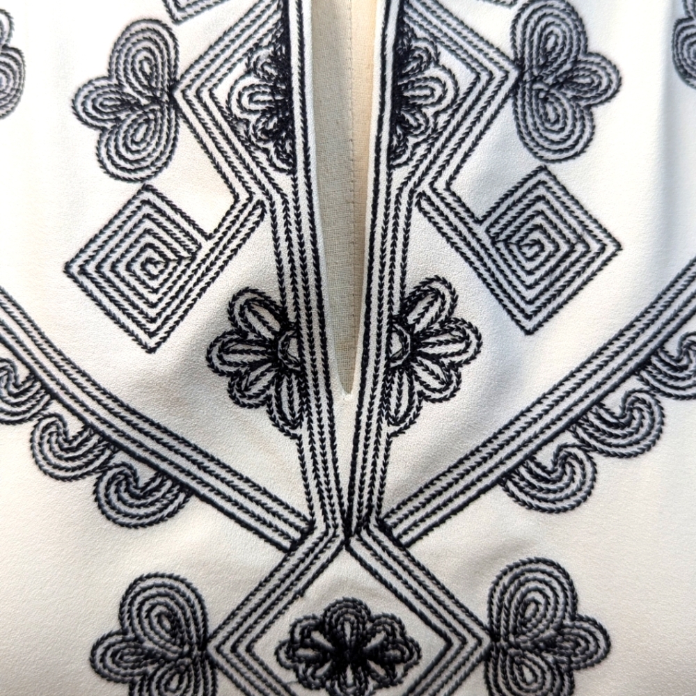 Timeless White Dress. Generous Cut. Exquisite Black Stitching Detail.